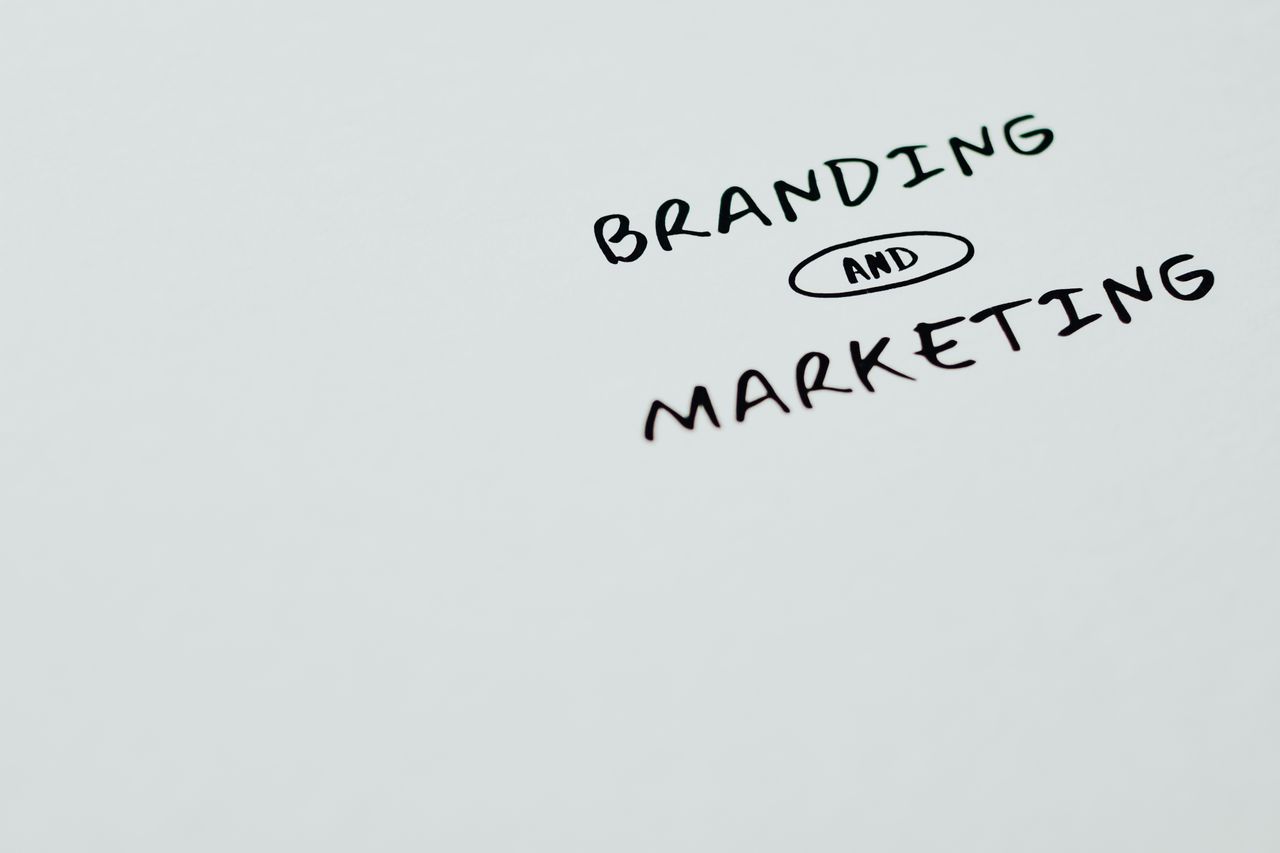 A clean, minimalist image displaying the words Branding and Marketing on a white background, perfect for digital marketing themes.